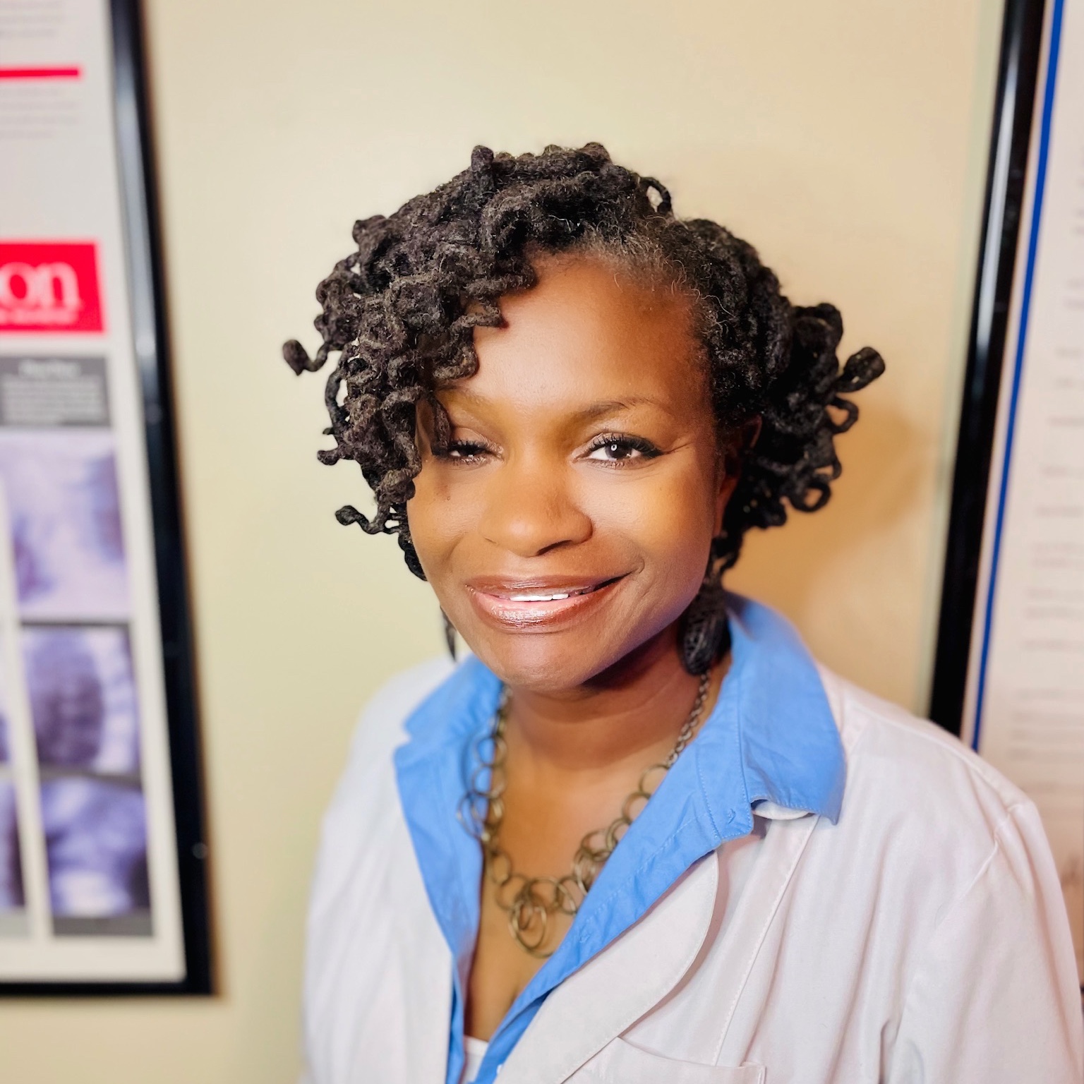 Dr. Eriidina Ojiiwawh, BA, DC, BCN